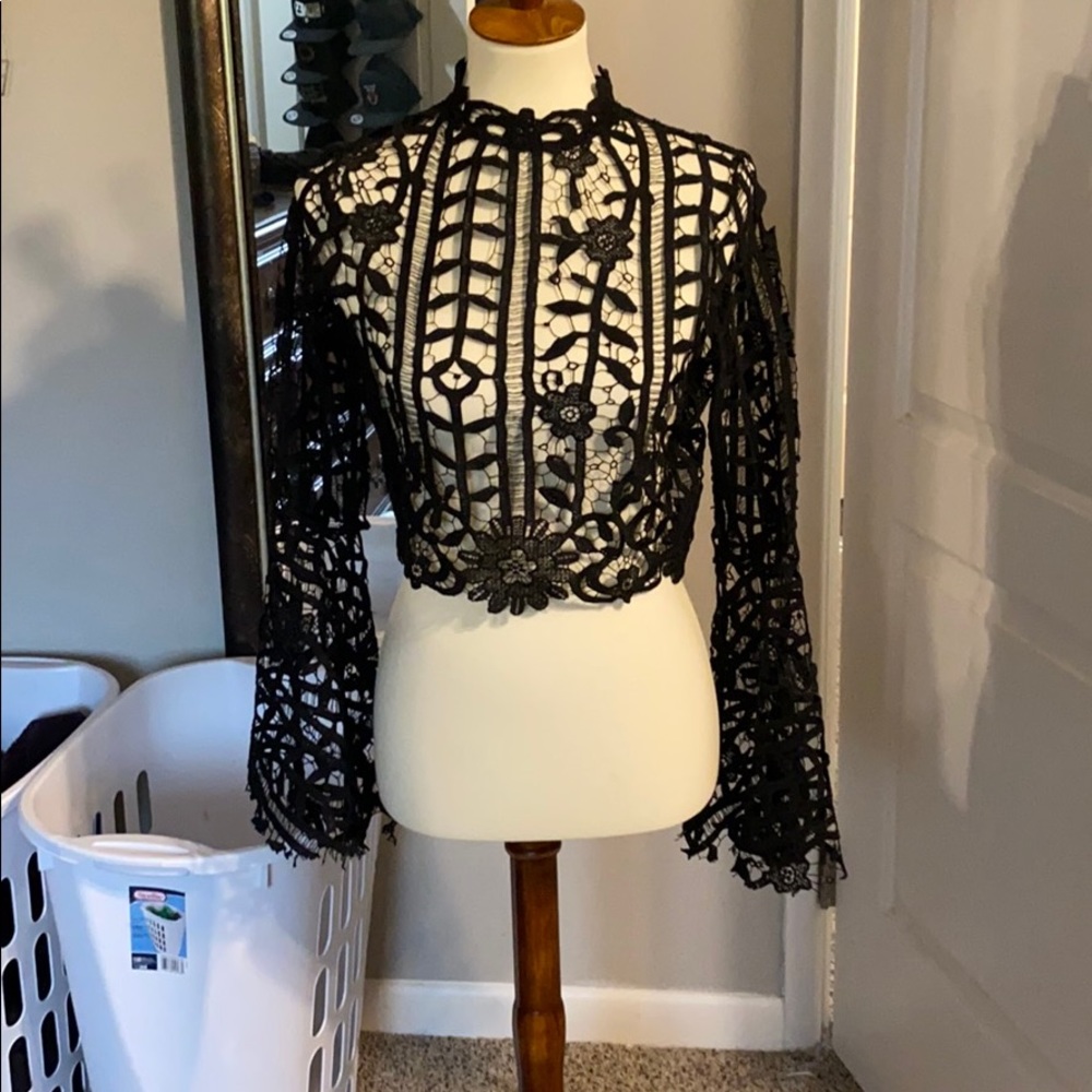 Lace crop top with bell wrist openings